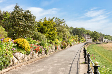 Grange-Over-Sands, Cumbria, UK - beautiful award winning gardens along the promenade on a sunny spring day. - obrazy, fototapety, plakaty