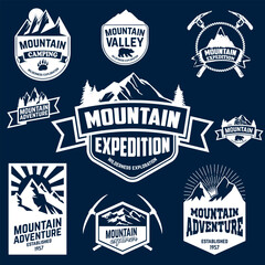 Naklejka premium Set of mountains, hiking and outdoor adventures emblems.