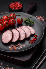 Delicious smoked sausage with salt and spices cut into slices