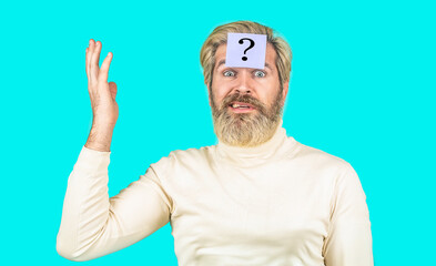 Paper notes with question marks. Beard man question mark in head, solution problems. Thinking man...