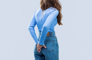 Hemorrhoids. Anus. Pain. Woman holds his hands to the ass feeling pain. Woman hand holding her...