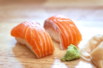 Sashimi sushi on the wood table. Sushi is a type of food preparation originating in Japan.