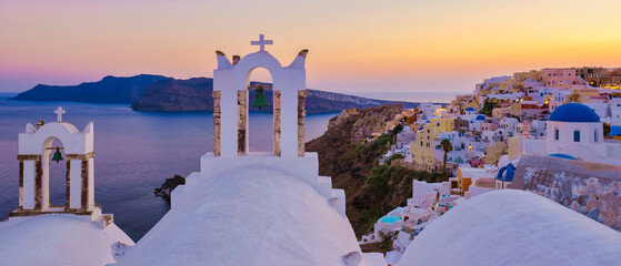 Santorini Greece, White churches and blue domes by the ocean of Oia Santorini Greece, a traditional...
