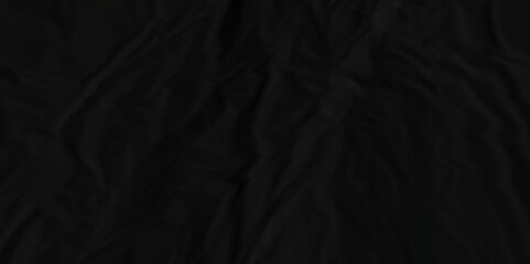 Dark black crumpled paper texture background. black crumpled and top view textures can be used for background of text or any contents.	