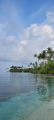 Fantastic tropical landscape with beach and clear clean sea on a sunny day.