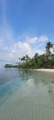 Fantastic tropical landscape with beach and clear clean sea on a sunny day.