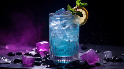 Summer cold galaxy blue cocktail made from Thai Butterfly pea tea. There are purple ice cubes on...