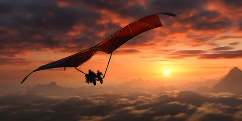 Keuken spatwand met foto Silhouette of hang gliding on clouds at sunset, Extreme sports concept © Black Pig