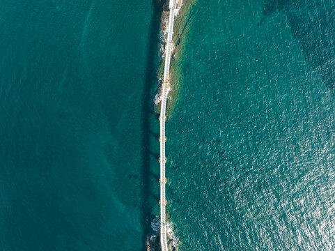 Aerial view of Vivara bridge connecting Vivara Island Natural reserve and Procida Island, Flegree Islands archipelagos, Naples, Campania, Italy.
