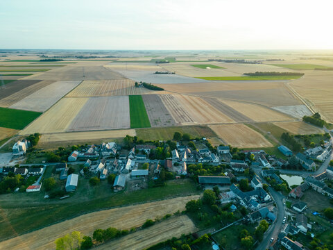 Aerial view of a field in countryside at sunset, Jouy-en-Pithiverais, Loiret, France.