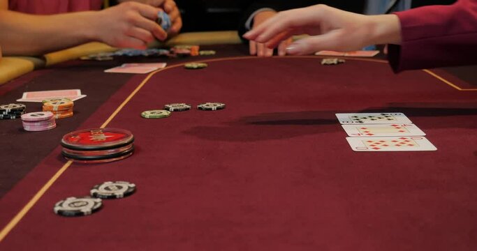 Cards and chips on the table in a casino, close-up