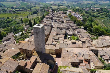 Fotobehang Borgo di San gimignano, in Toscana, vie del centro storico, attrazioni, panorami © Enricoazzola