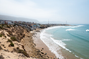 A small village sits on the oceans edge