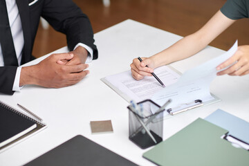 Human resources manager asking employee to fill application form