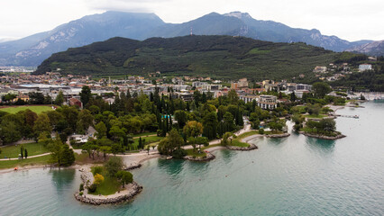 Fototapeta na wymiar beautiful aerial view of mountains and italian town Riva del Garda