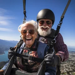 Tuinposter senior couple selfie during paragliding © 22Imagesstudio