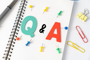 Q and A, Wooden alphabet on table ,Q&A, FAQ concept.