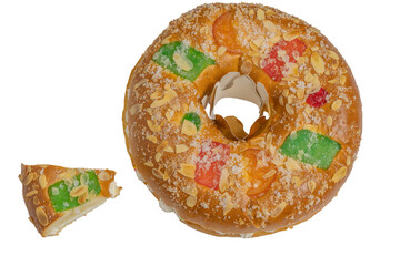 roscon de reyes, typical spanish dessert on the day of kings, in transparent bottom, which keeps two surprises inside.