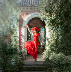 girl in a red dress and hat