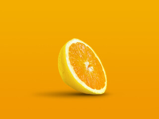 Orange with lemon texture on pastel orange background. Creative summer idea. Minimal fruit concept....