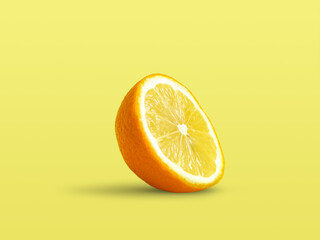 Lemon with orange texture on pastel yellow background. Creative summer idea. Minimal fruit concept....
