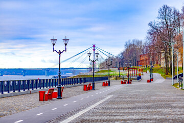 View of Aleksandrovskaya embankment in Cherepovets, Russia in selective focus on the banks of the Sheksna river. Walk for health in the fresh air.