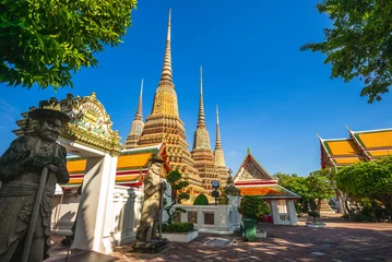 Selbstklebende Fototapeten Phra Chedi Rai of Wat Pho, a Buddhist temple complex in Bangkok, Thailand. © Richie Chan