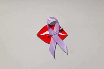 Purple ribbon, concept for the day of elimination of violence against women.