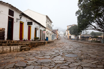 Fog apparent on the stone streets and colonial houses in the historic city of Tiradentes, Minas...