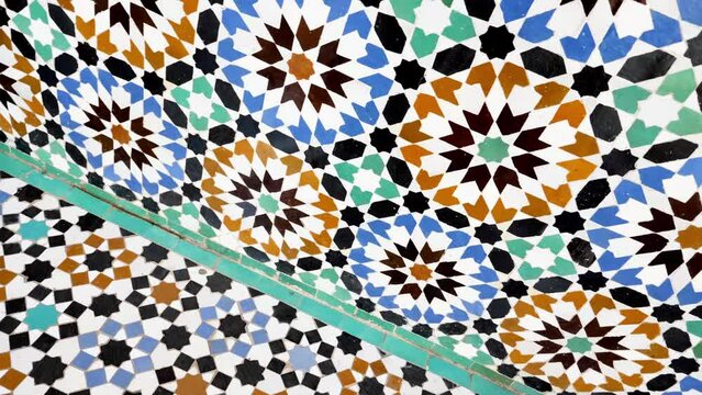Traditional Moroccan tiles, interior design. Abstract geometric mosaic tile pattern, Arabic Andalusian architecture. 4k footage.