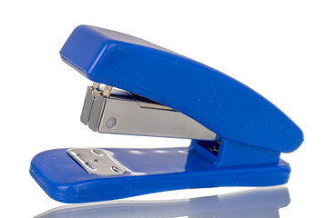 One office stapler, macro, isolated on white background.