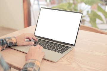 computer screen blank mockup.hand woman work using laptop with white background for advertising,contact business search information on desk at coffee shop.marketing and creative design