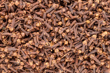 Dry aromatic cloves, macro, top view.