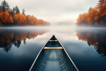 A lonely boat rest on tranquil and glassy lake with beautiful and colorful landscape with Fall foliage. Autumn seasonal concept.