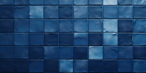 A blue tile wall with squares on it,blue, tile, wall, squares, geometric, pattern, abstract, contemporary, Blue Tile Wall with Geometric Square Pattern
