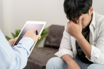 man with mental health problems is consulting. psychiatrist is recording the patient's condition for treatment. encouragement, love and family problem, bipolar , depression patient, protect suicide