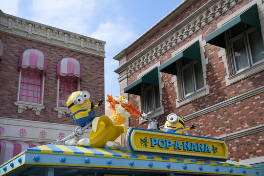 Japan - April 03, 2023: Minions Popcorn Banana 3D decoration on food truck design in popular amusement park landmark from Universal Studios Japan, Osaka
