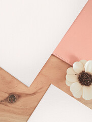 Top view  two sheets on desk, Empty White Sheet on Wooden Table - Flat lay mockup,  - flower, wood and pink - soft, cosy, boho ambiance
