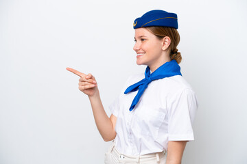 Airplane stewardess woman isolated on white background pointing finger to the side and presenting a product