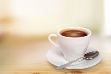 Hot tasty latte coffee in a ceramic cup