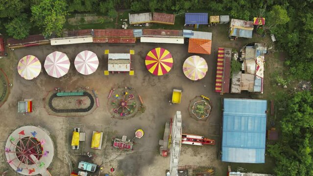 A top-down view of an empty funfair in the daytime in Malaysia 4K