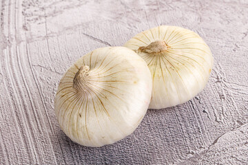 Raw white onion heap isolated