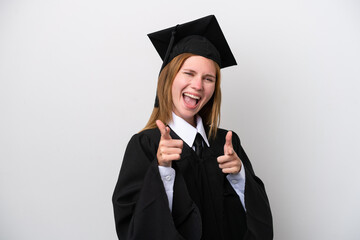 Young university graduate English woman isolated on white background pointing to the front and smiling