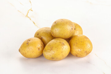 Raw young baby potato heap