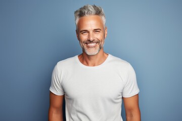 Obraz premium Mature smiling man studio portrait. AI generative