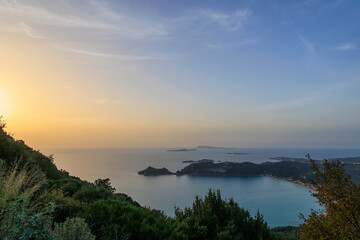 Sunset over the sea and the bay of Agios Georgios on the island of Corfu