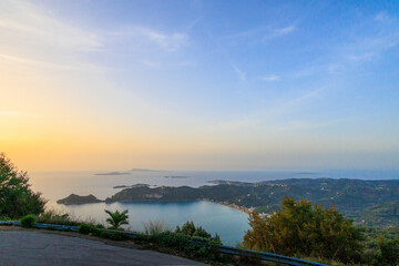 Sunset over the sea and the bay of Agios Georgios on the island of Corfu