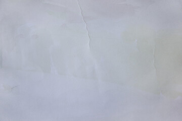 White neutral background. Old paper texture with implicit weathered bends. Blurry stains faded surface vintage effect.