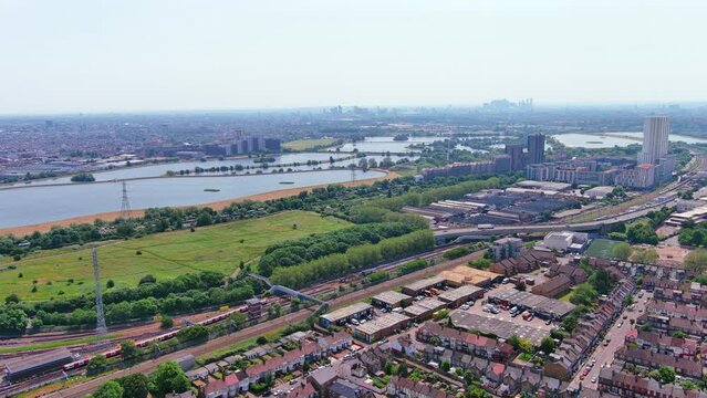 London, England: Aerial view of capital city of UK, Walthamstow Wetlands on sunny summer day with clear blue sky - landscape panorama of United Kingdom from above