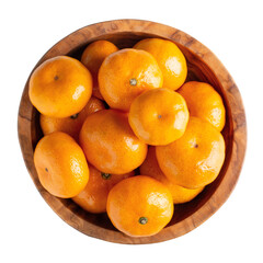 Mini tangerines in wooden bowl isolated on white. Top view.
